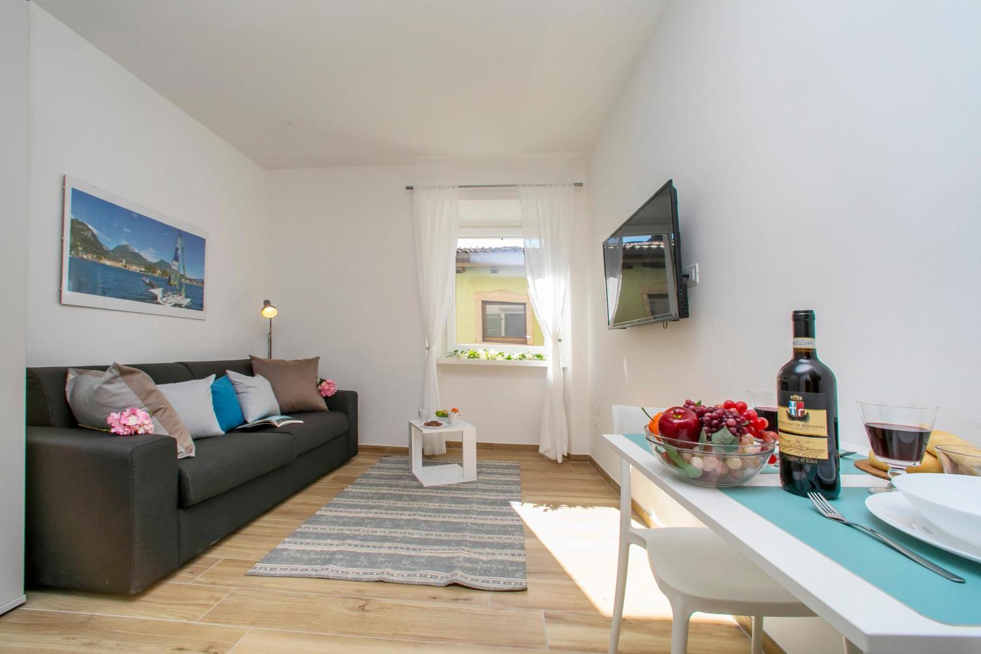 Nido Sui Tetti Di Riva Del Garda - Happy Rentals ภายนอก รูปภาพ