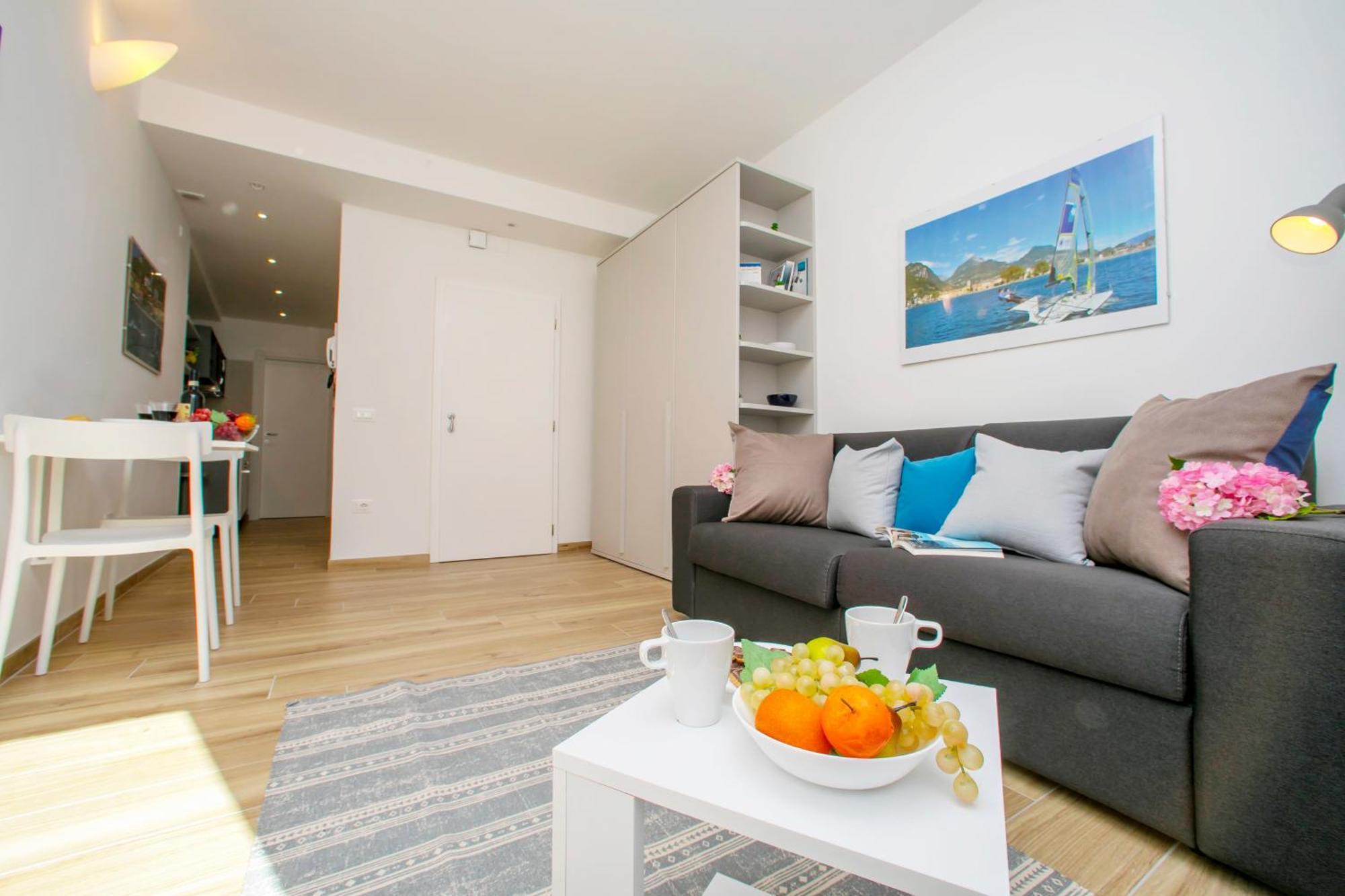 Nido Sui Tetti Di Riva Del Garda - Happy Rentals ภายนอก รูปภาพ